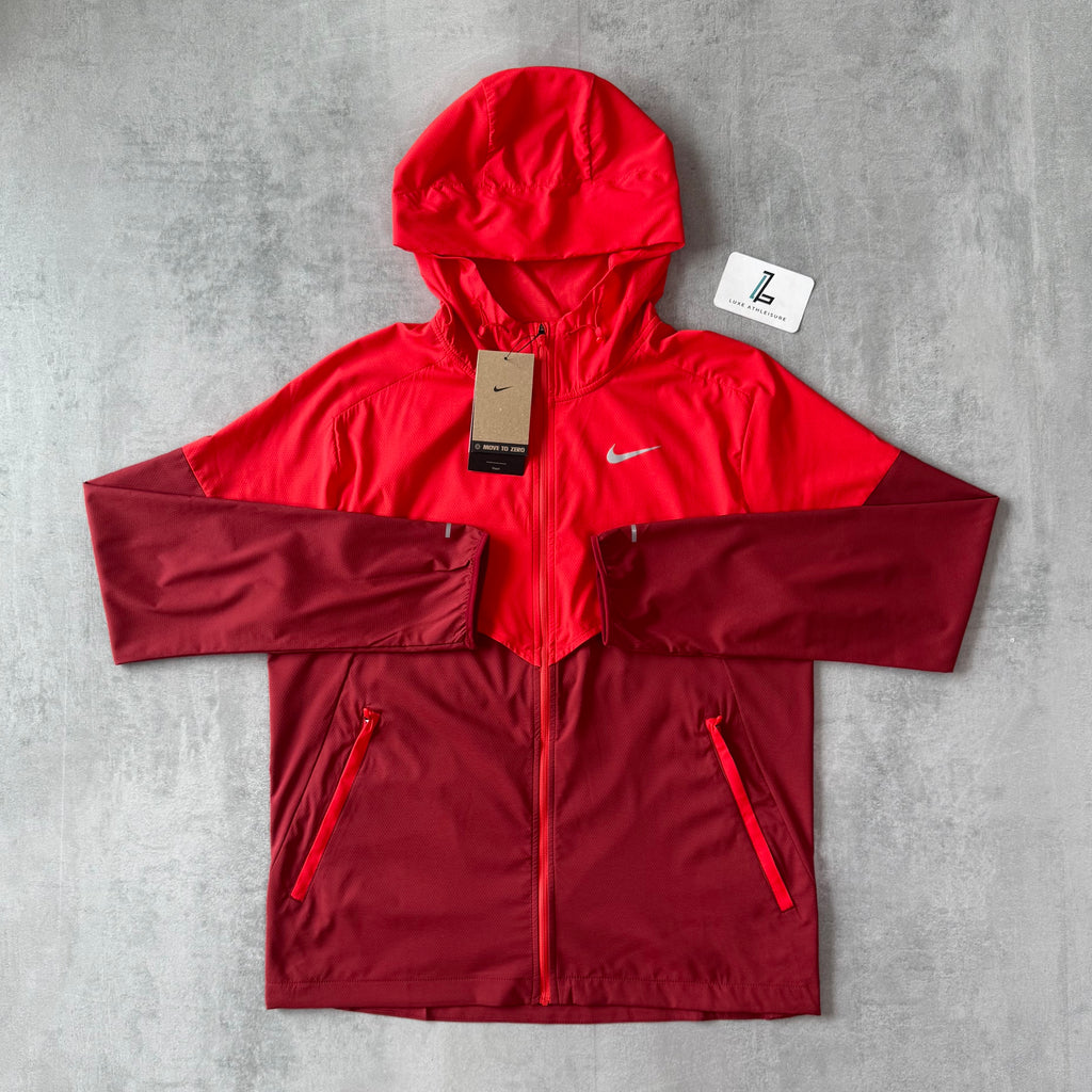 NIKE UV WINDBREAKER ‘LIGHT CRIMSON/RED’