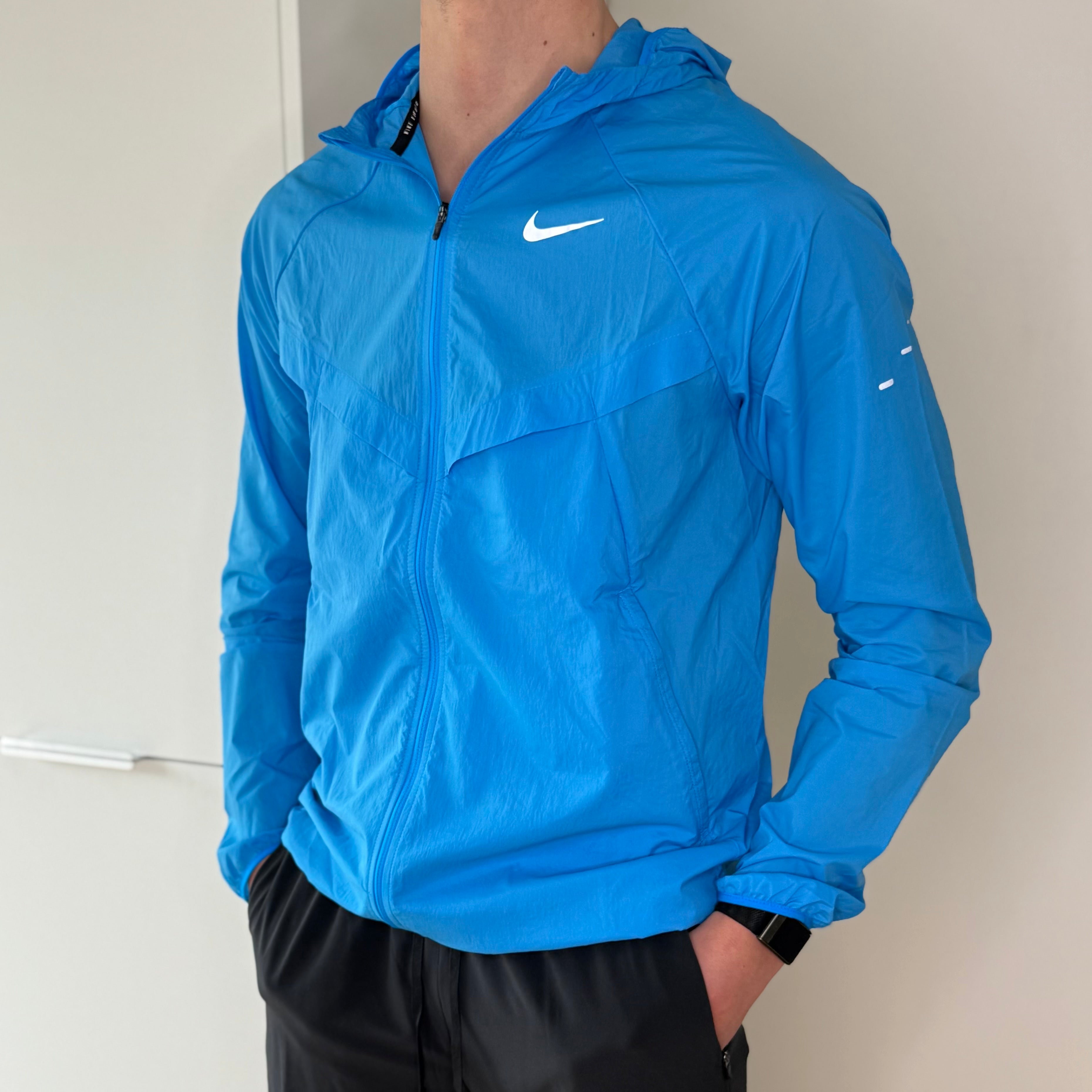 NIKE STRIDE WINDBREAKER ‘BLUE HERO’