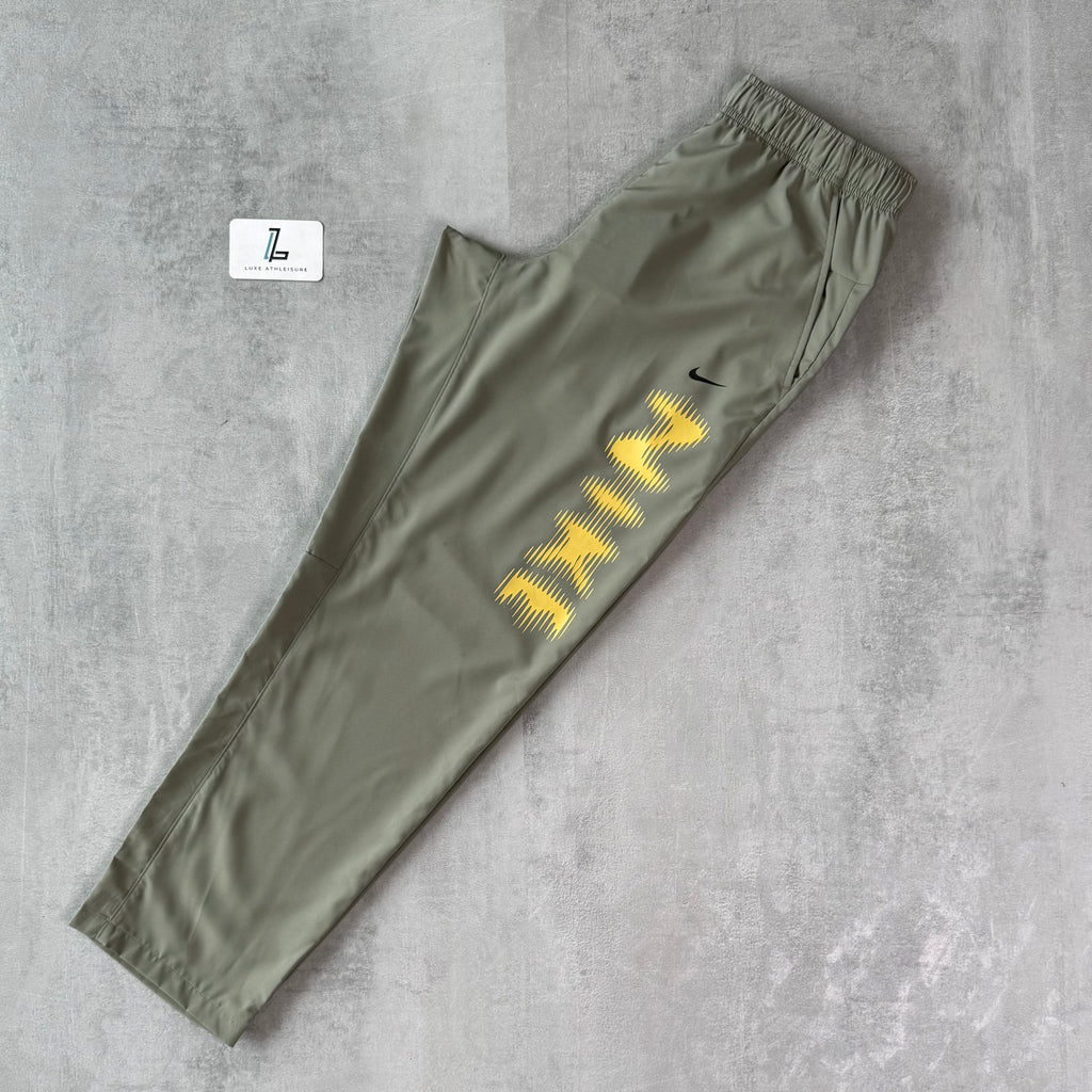NIKE FORM TRACKSUIT ‘LIGHT ARMY/SATURN GOLD’