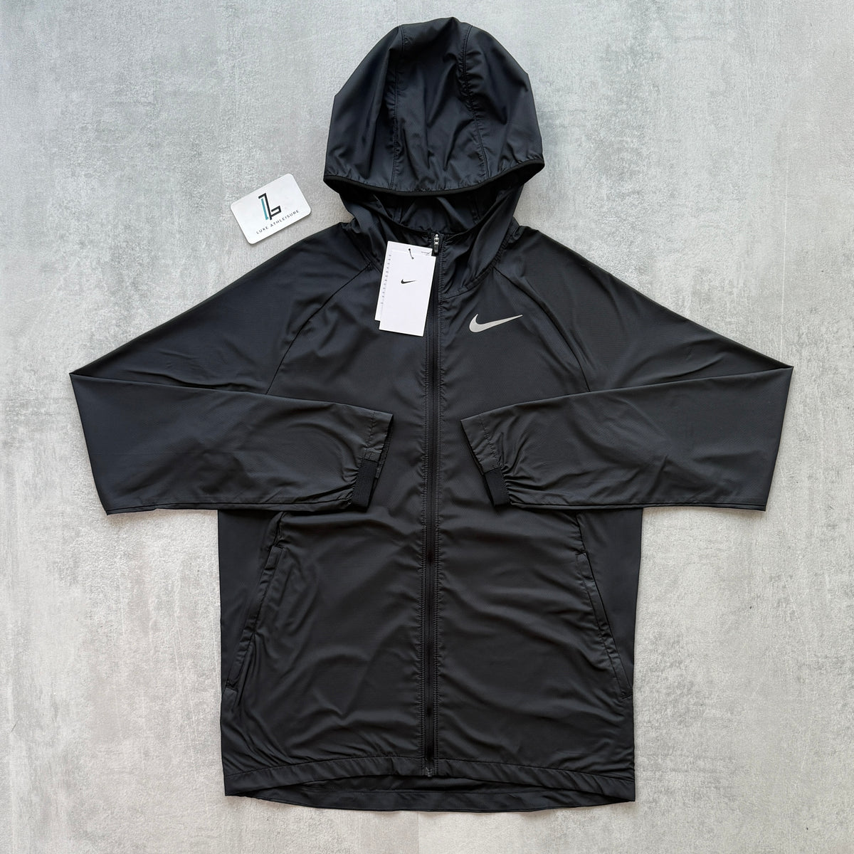 NIKE ESSENTIAL WINDBREAKER ‘BLACK’